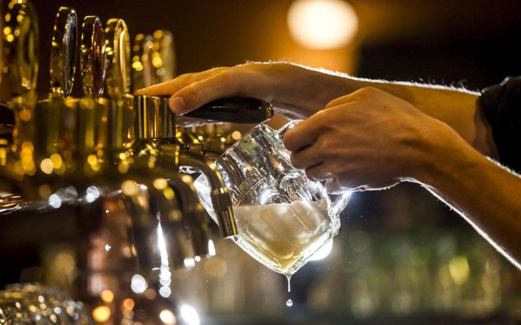84137617_a_barman_pours_a_glass_of_beer_from_a_tap_in_the_restaurant_at_the_pilsner_urquell_brewery-xlarge_transgsao8o78rhmzrdxtlqbjdebghfezvi1pljic_pw9c90